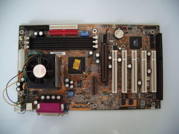Gigabyte GA 6VXC-4X-P motherboard, with Pentium 3 processor and HSF attached.