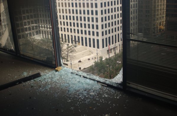 A photo out a broken window from their office