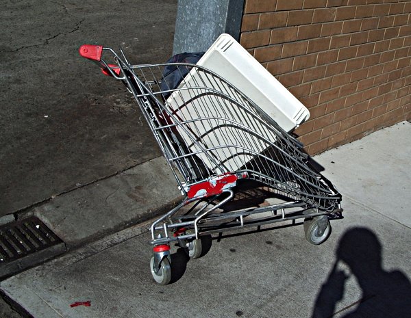 A completely pwned trolley, presumably by a semitrailer